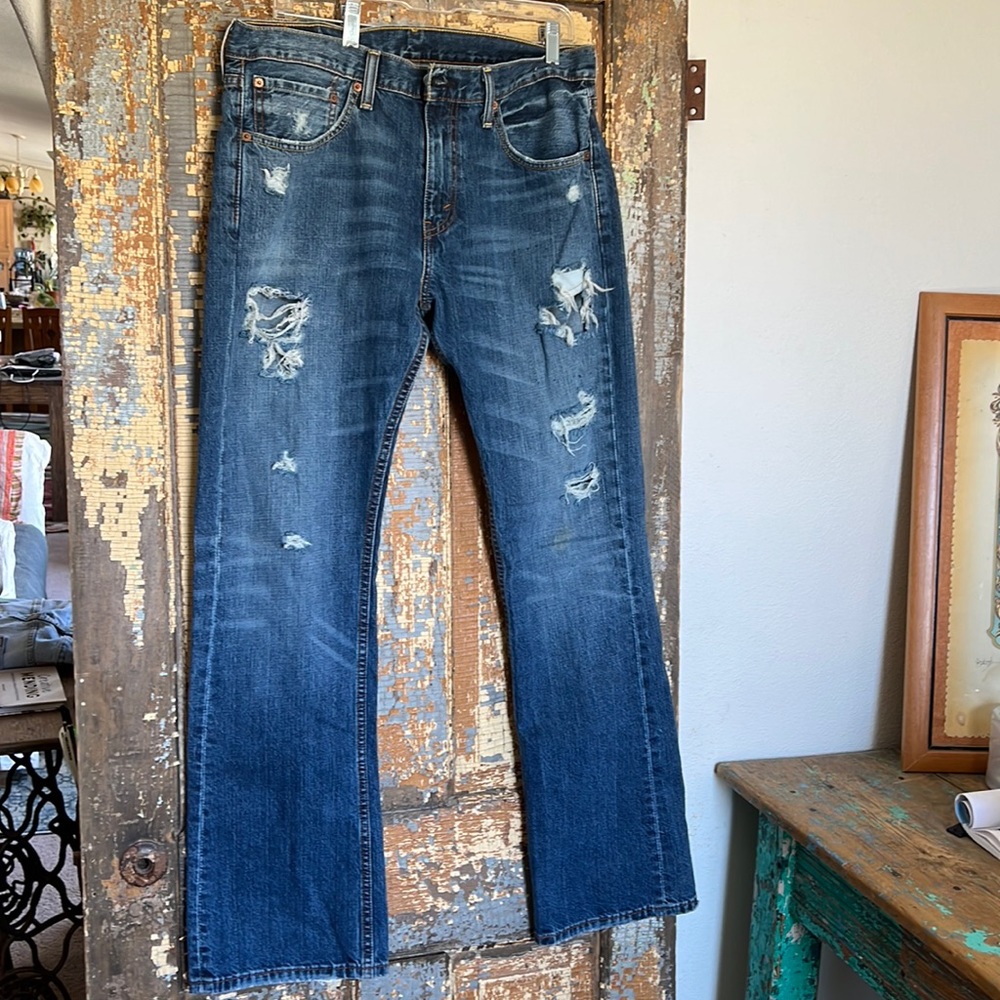 Levi’s 527 style (bootcut). 34 x 32